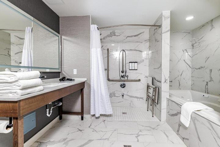 Accessible King Bed with Roll in Shower Plus Sofa Bed (19 of 24)