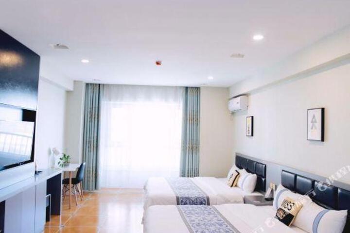 Xinyadun Hotel