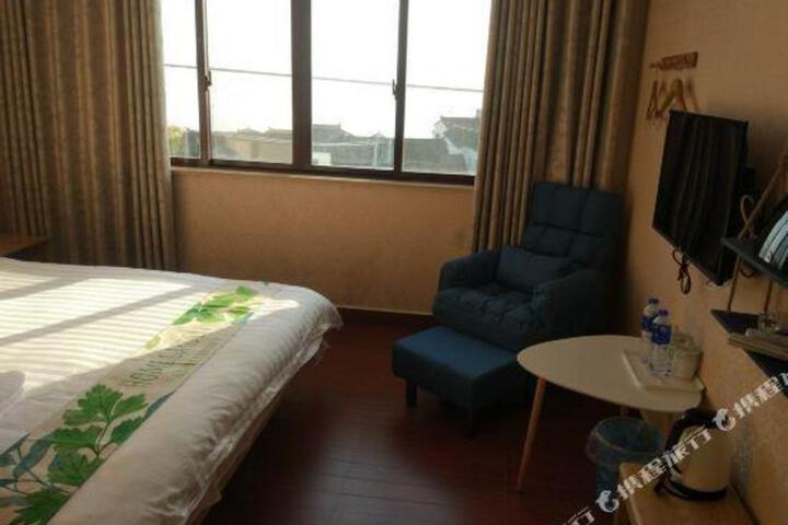 Xinju Cafe Hotel