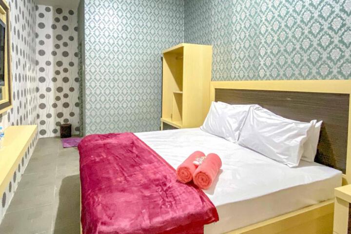 Tinis Guest House Malang Mitra RedDoorz