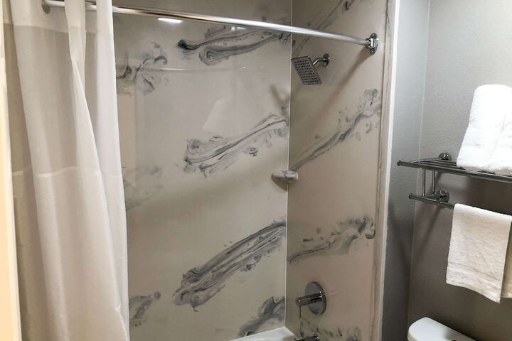 1 King Bed Mobility Accessible Roll in Shower (16 of 16)