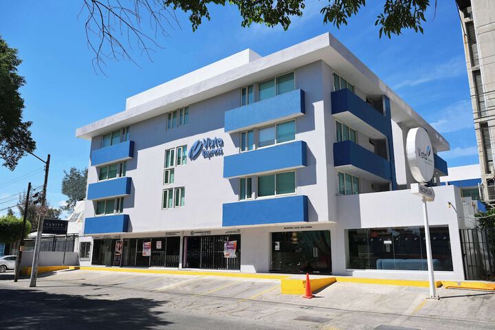 Exterior of Vista Express Guadalajara Expo SureStay Collection by BW