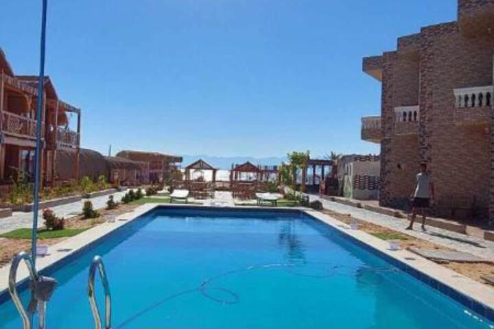 Green Beach Camp & Hotel