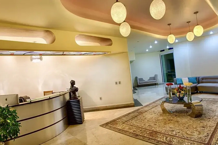 Exterior of Luxury Suite With Garden and Ocean View