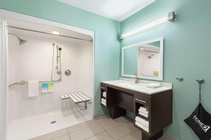 1 King Mobilty Hearing Accessible Roll in Shower Suite (4 of 8)
