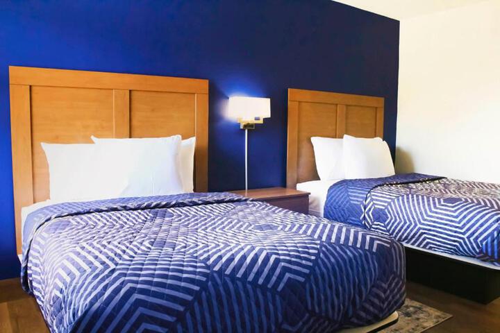 Basic Room 2 Double Beds Exterior Entry (2 of 3)