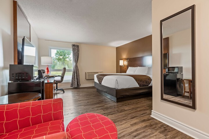 1 King Bed Flat Screen Television Desk High Speed Internet Accessible Microwave and Ref (9 of 14)