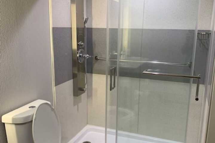 1 King Bed Mobility Accessible Roll in Shower (6 of 12)