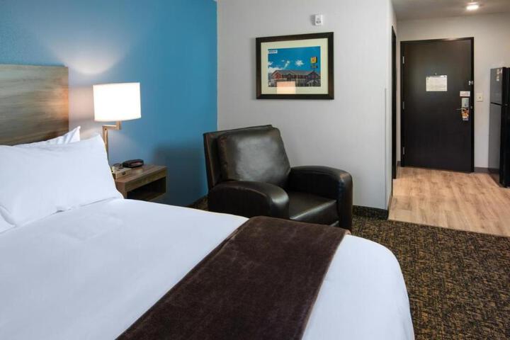1 Queen Bed with Recliner (1 of 19)