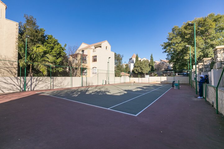 Tennis and Basketball Courts 30 of 35