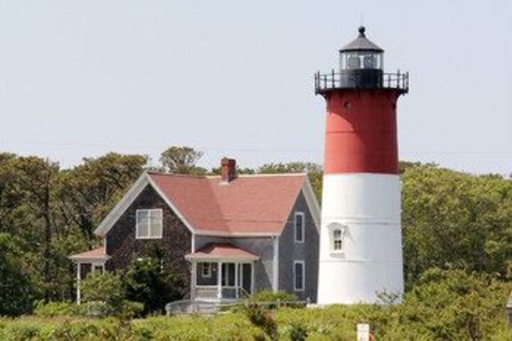 Exterior of Cape Cod Home in The Trees by RedAwning