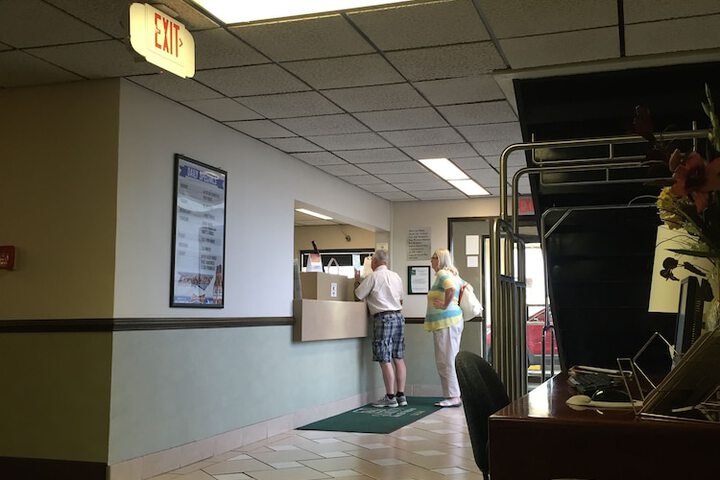 Check-in/check-out kiosk