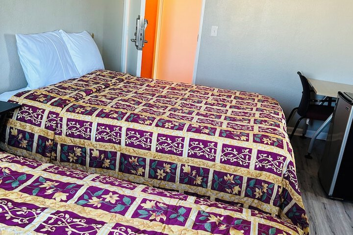 Basic Single Queen Bed Shared Bathroom (1 of 4)