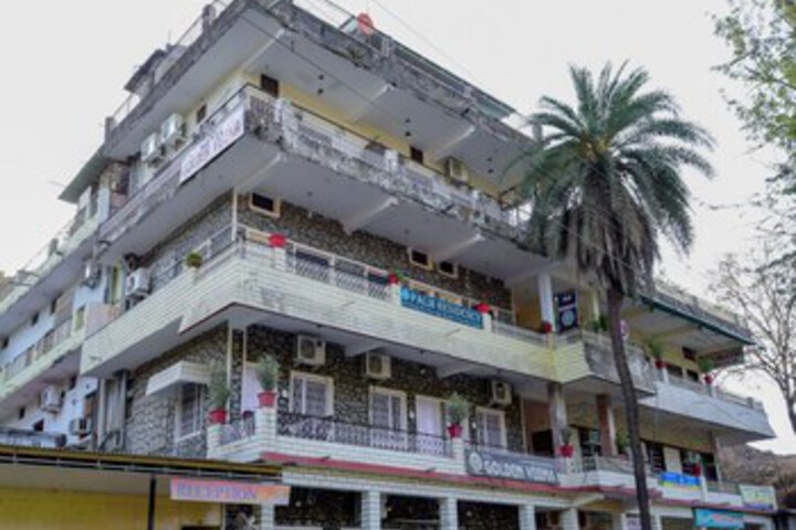 OYO 13553 Palm Residency