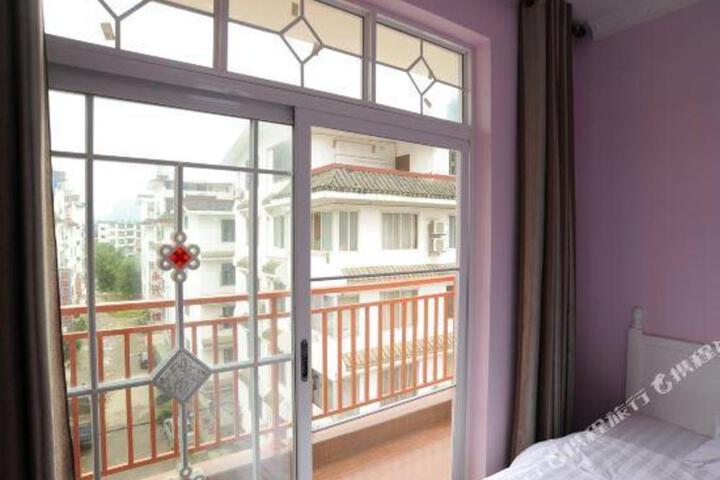Yangshuo Fenglin Evening Inn (Bus Terminal Opera House Store)