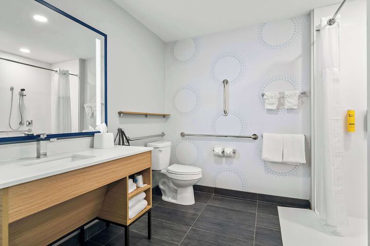 1 King Bed with Walk in Shower (1 of 12)