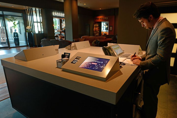 Check-in/check-out kiosk
