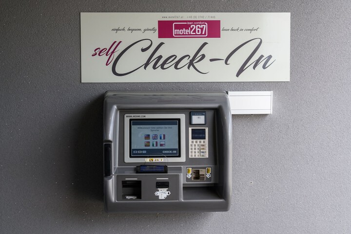 Check-in/check-out kiosk