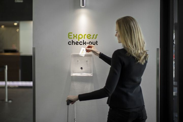 Check-in/check-out kiosk