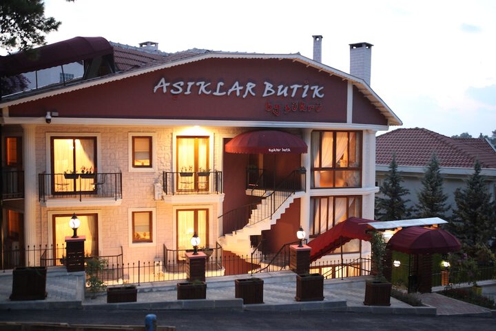 Exterior of Asiklar Hotel by Sukru