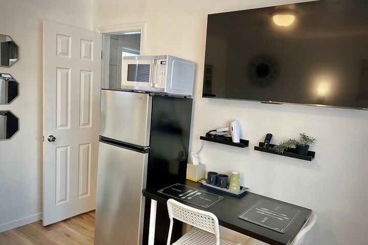 Design Room 1 Queen Bed Refrigerator, Microwave (1 of 10)