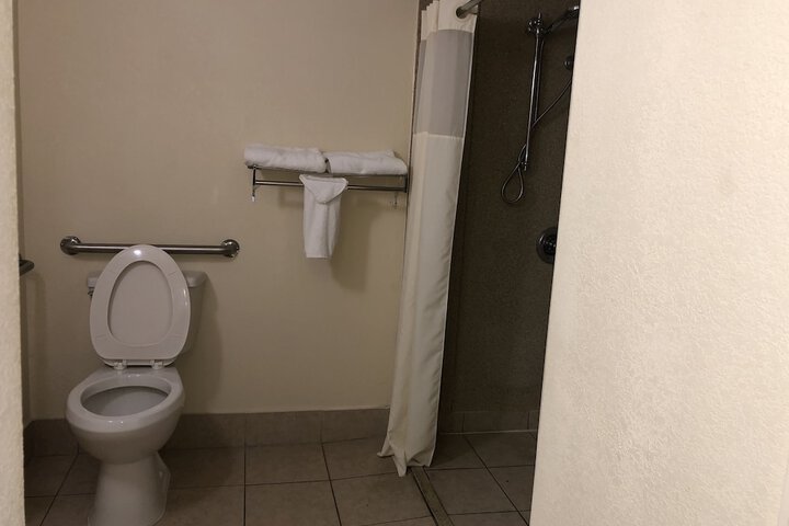Raised toilet seat