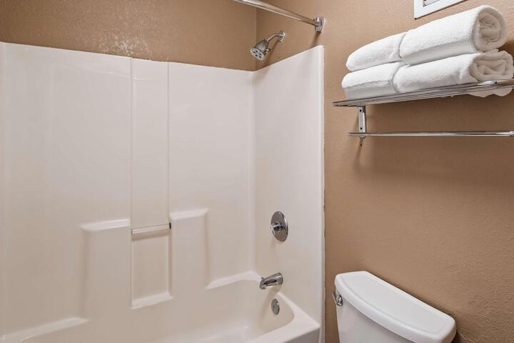 Suite 1 King Bed High Speed Internet Accessible Sofa For Sitting Separate Living Area Microwave and Refrigerator, Continental Breakfast (2 of 6)