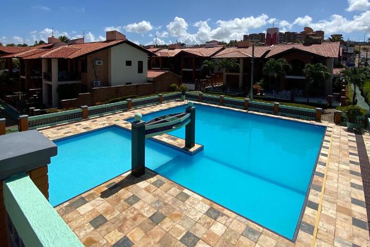 Linda casa Porto das Dunas: 4 suítes churrasqueira e piscina