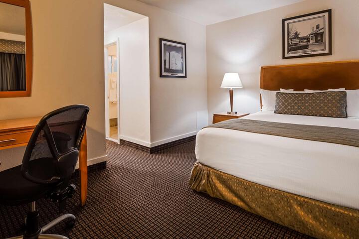 1 King Bed Patio Pool View Microwave and Refrigerator WiFi Continental Breakfast (5 of 8)
