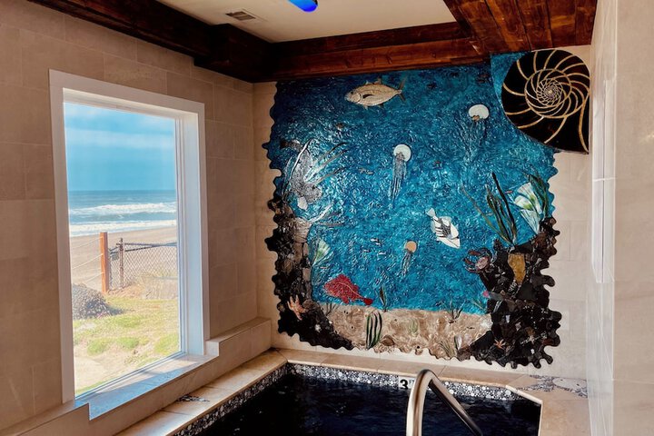 Pool image of The Sandcastle Beachfront Hotel