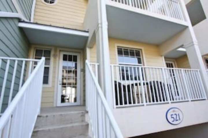 Exterior of water views from Balconies 3 Br townhouse by RedAwning