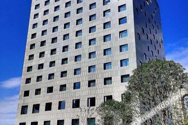 Xinchang Wozhou Junyi Hotel