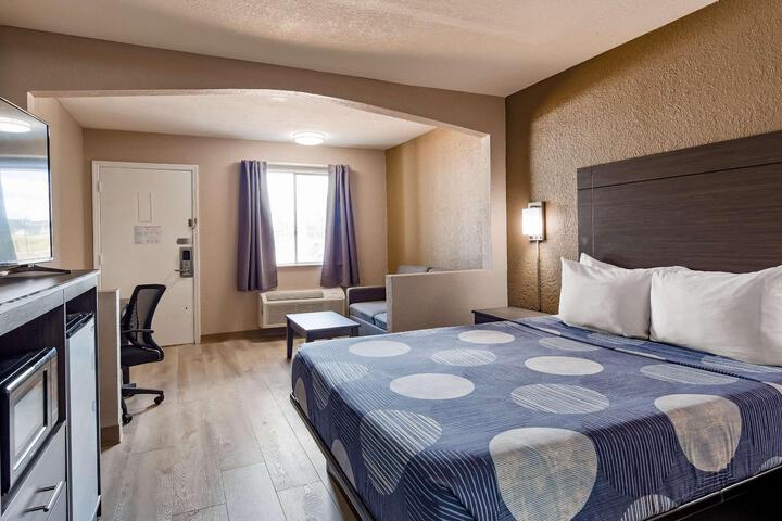 1 King Bed Flat Screen Television Microwave and Refrigerator High Speed Internet Accessible (7 of 8)