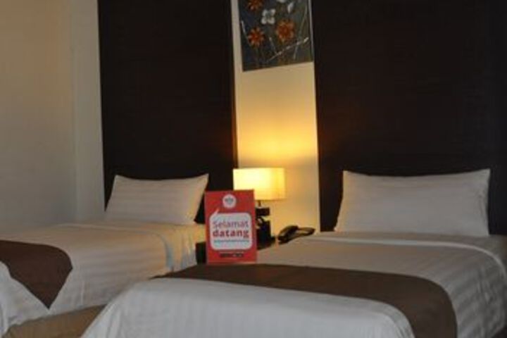 Nida Rooms Bogor Jalan Padjadjaran Raya at Padjadjaran Suites Hotel Bo