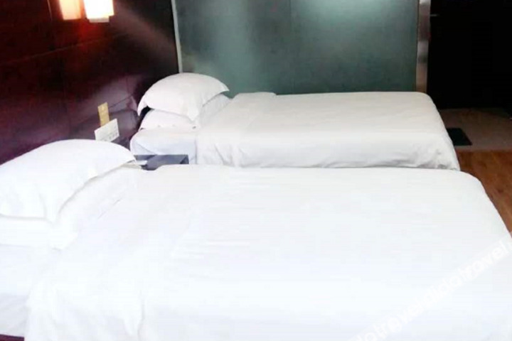 Feixian Quanji Hotel