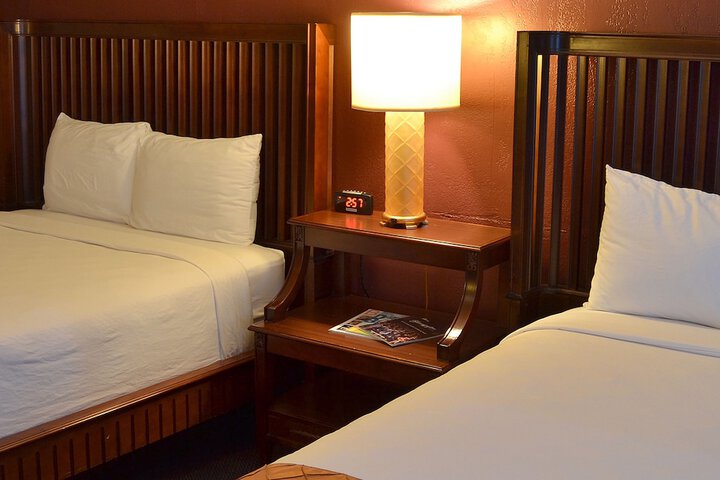 Deluxe Room 2 Queen Beds Refrigerator, Microwave Courtyard Area (2 of 18)