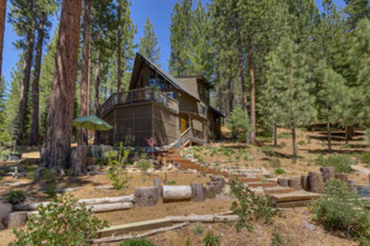 Exterior of Glen Eagles Retreat by RedAwning