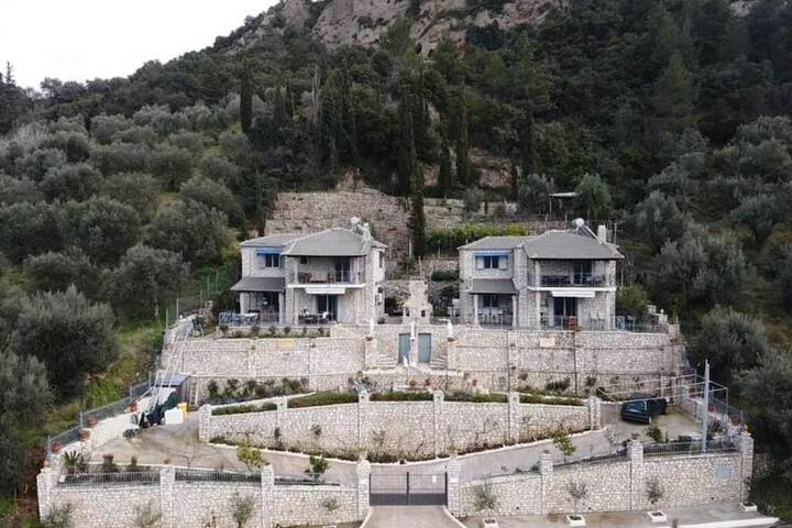 Stone Maisonettes in Aigialeia
