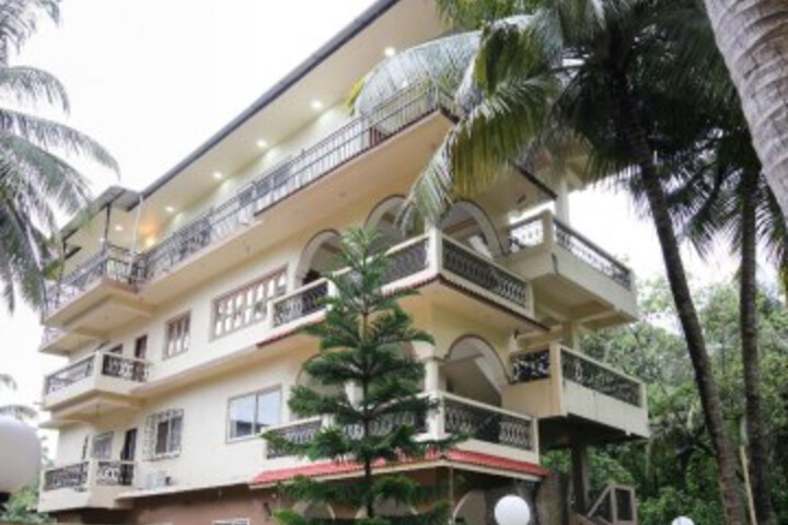 OYO 47344 Morjim Palms Stays