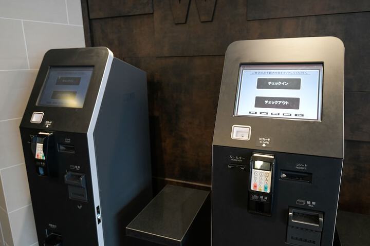 Check-in/check-out kiosk