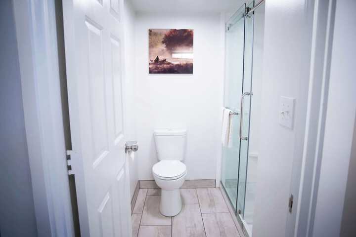 Accessible 1 Queen Accessible Roll in Shower Theme Room Work Desk Microwave and Refrigerator (1 of 8)