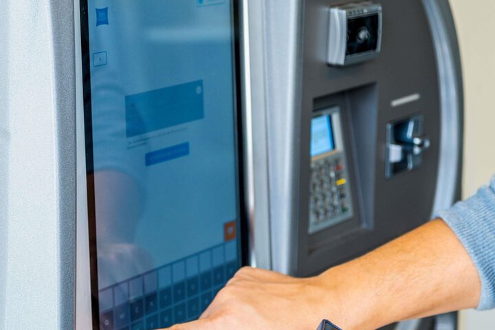 Check-in/check-out kiosk