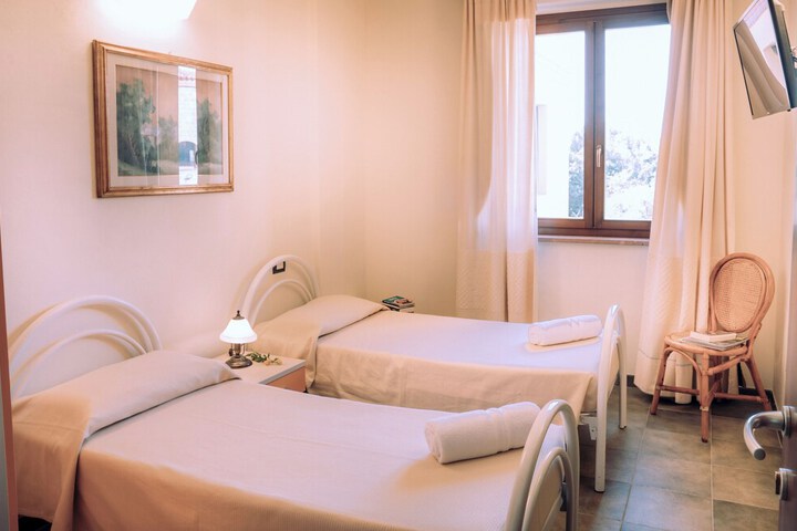 Hotel with swimming pool in Arbus in Arbus