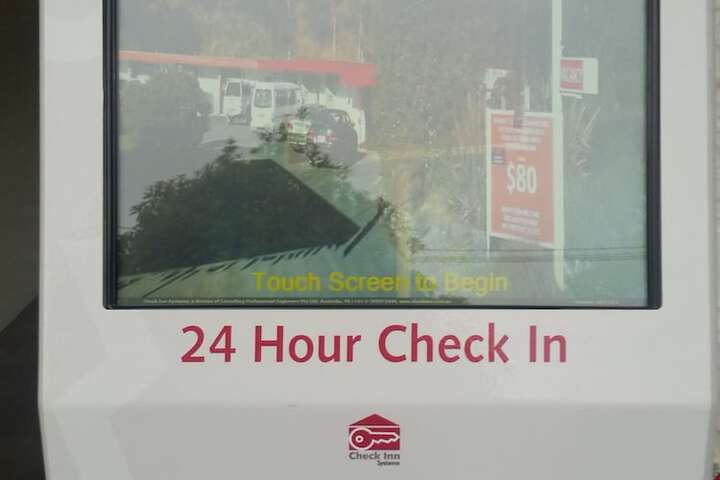 Check-in/check-out kiosk