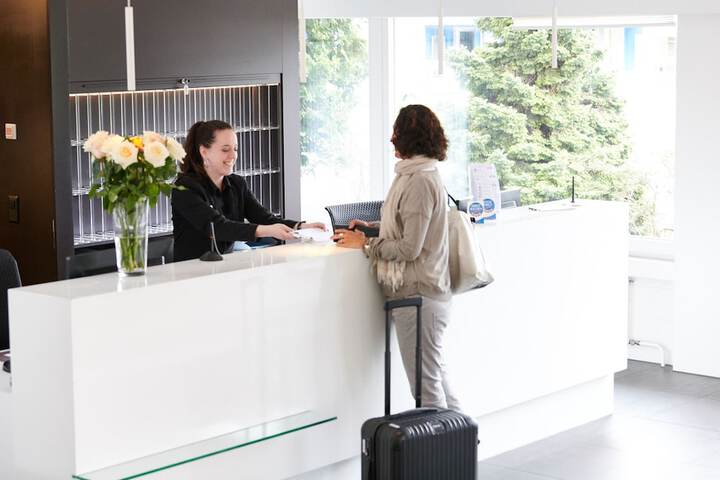 Check-in/check-out kiosk