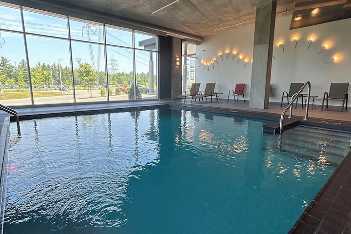 Swimming pool at Grand Hôtel TiMES Blainville - Mirabel