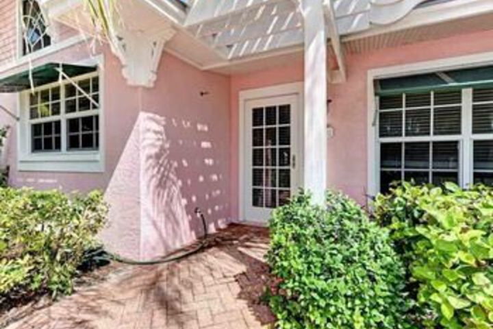 Exterior of Palm Isle 3201 by RedAwning