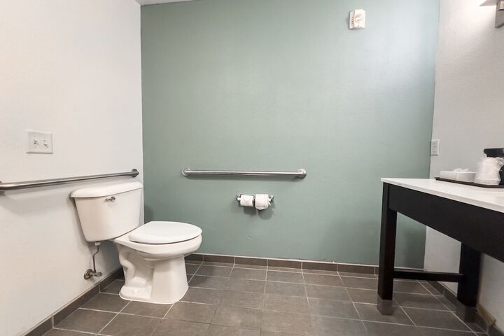 Raised toilet seat