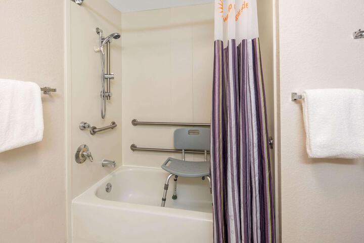 1 King Bed Mobility Accessible Roll in Shower (3 of 11)