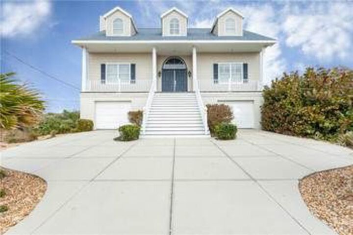 Exterior of Sunrise Serenade 3 Br home by RedAwning